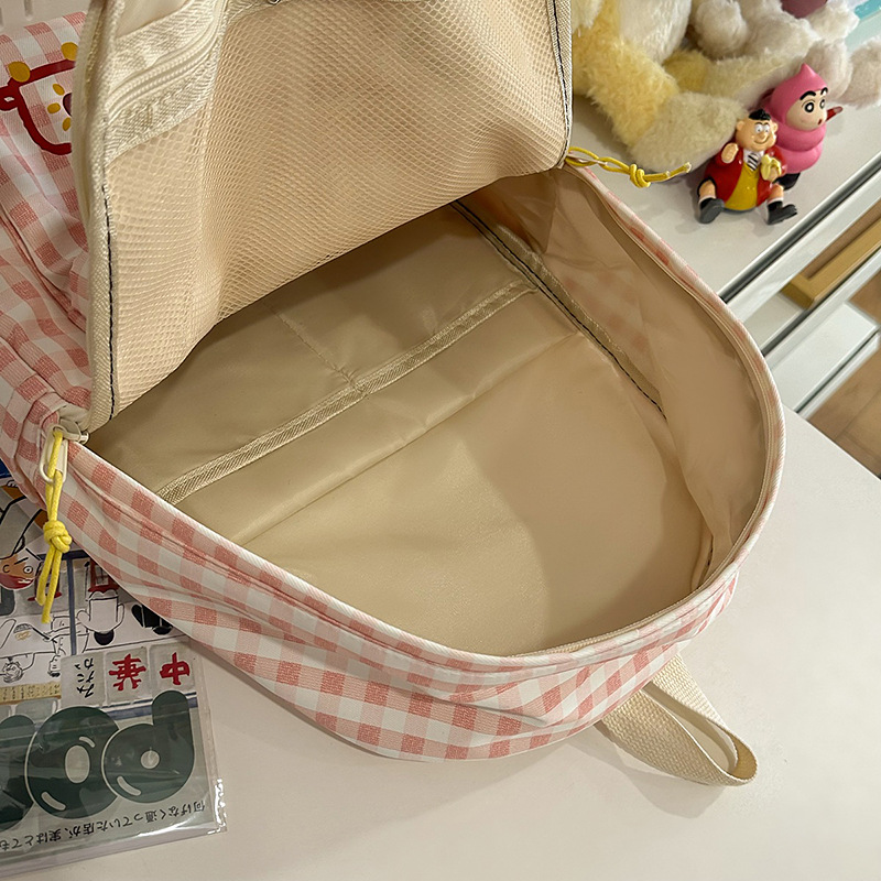 Japanese-style fresh, sweet and casual schoolbags for junior and senior high school students, simple and versatile backpacks, ins lightweight cartoon backpacks Application Scenario