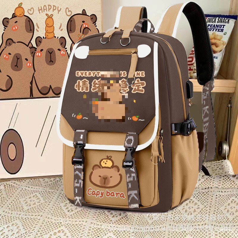 Customized wholesale of new brown primary school backpack, cute cartoon water-resistant Capibara double-shoulder school backpack details Picture