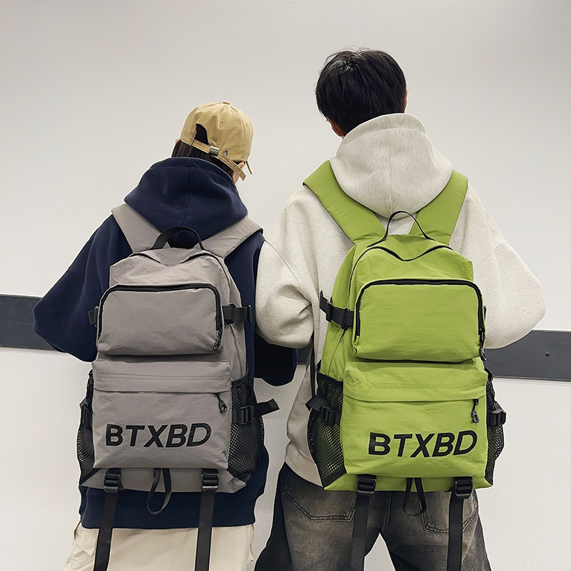 Outdoor sports and leisure large-capacity backpack, couple style commuter hiking bag, versatile college student computer class bag full figure
