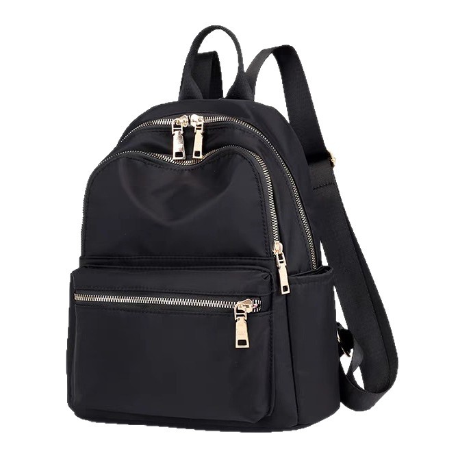 The 2025 new trendy travel Oxford fabric small backpack for women is a versatile and fashionable bag that goes well with women in summer Item Picture