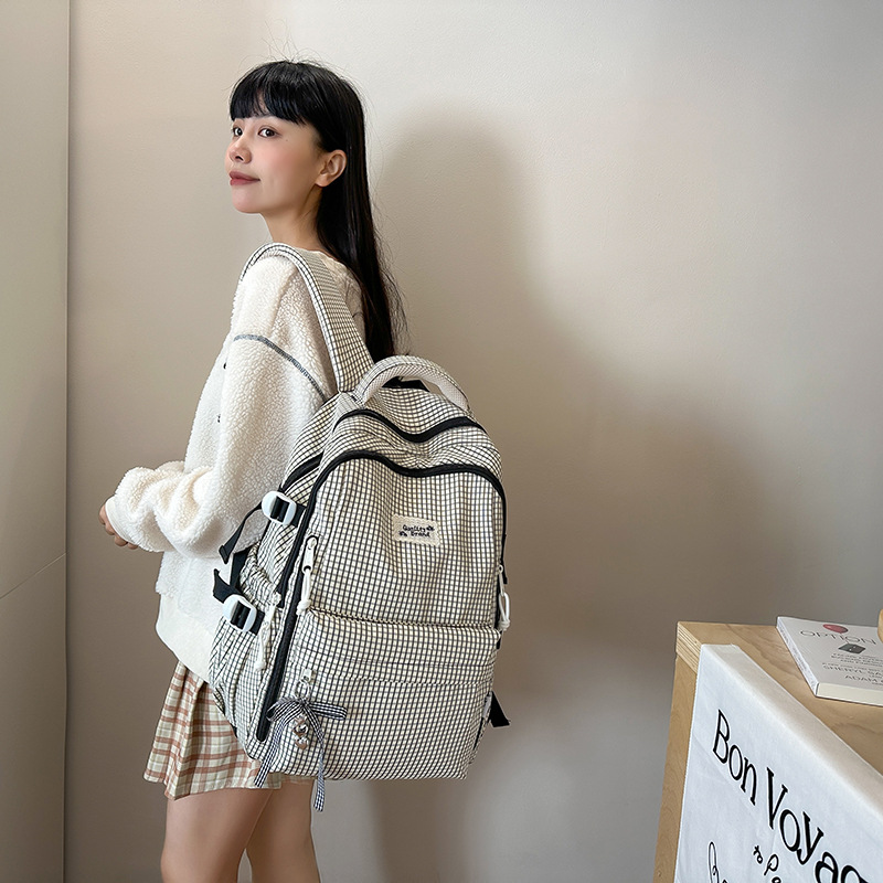 High-appearance-level checkered schoolbag for female college students, casual backpack for junior high school students, large-capacity versatile backpack for senior high school students, trendy details Picture