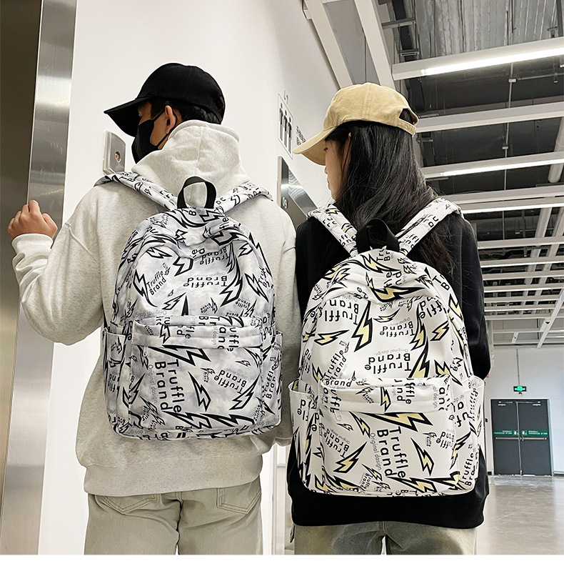 Korean version Haraju-style junior high school student graffiti backpack, large-capacity casual travel bag, gender-specific schoolbag full figure