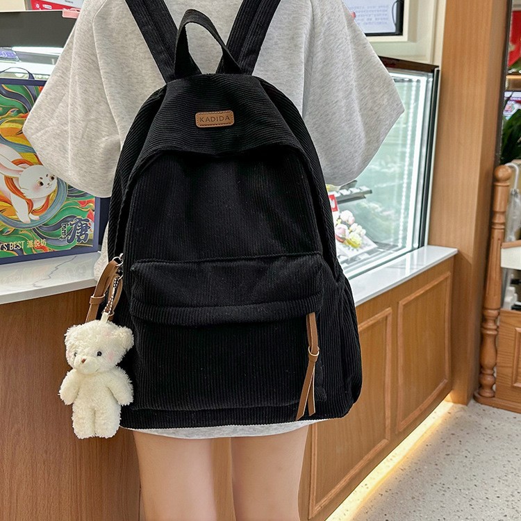 New autumn and winter corduroy backpack, a fashionable new Korean-style backpack, a lightweight and versatile bag for both boys and girls Application Scenario