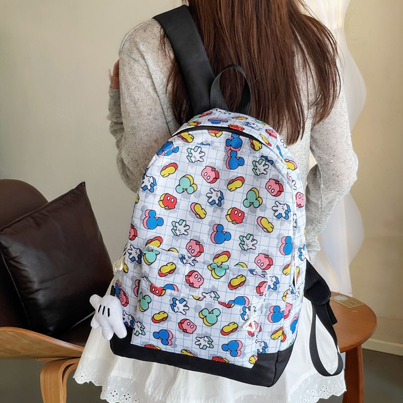 A new high-appeal, fresh and sweet, cartoon-printed backpack for girls, casual and versatile, lightweight and large-capacity backpack full figure