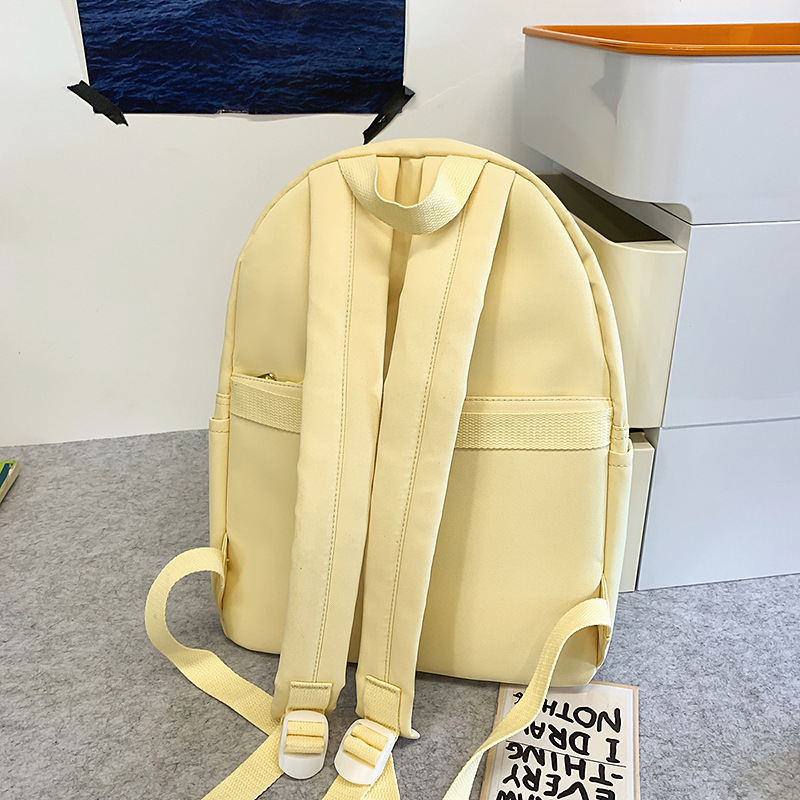 Summer fresh taro purple girlish backpack, Japanese-style ins solid color campus style backpack for junior and senior high school students Application Scenario