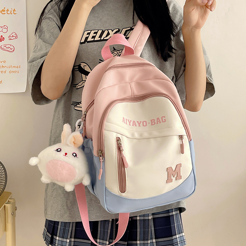 A small backpack for children's spring outing and study tour, a Japanese-style Instagram sweet color contrast forest-style mini backpack for girls' travel and shopping full figure