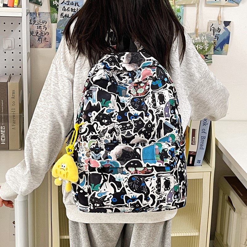 A new high-appeartion-level Japanese-style, niche, individualistic, graffiti comic, cool backpack for both men and women, lightweight and large-capacity backpacks full figure