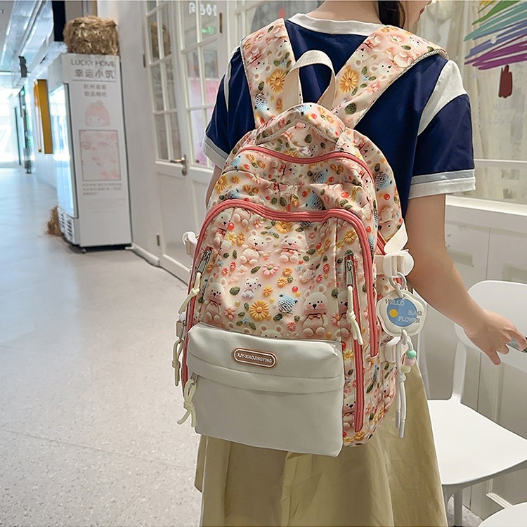 A new high-appearant-level fashionable cartoon 3D bear graffiti backpack for female students, a large-capacity backpack for casual commuting details Picture