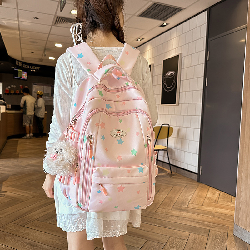 The new Japanese-style ins high-appearance-level fresh, sweet and cute star backpack is a large-capacity backpack for junior and senior high school students details Picture