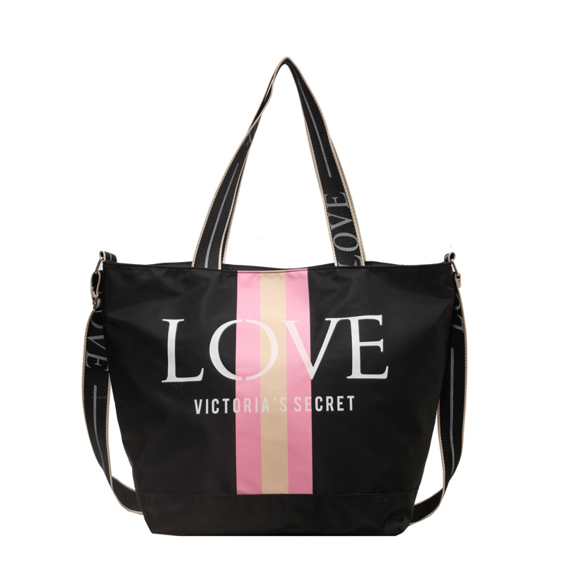 2025 New canvas bag, large-capacity hand-held tote bag, simple, casual and versatile shoulder bag, fashionable yoga bag Item Picture