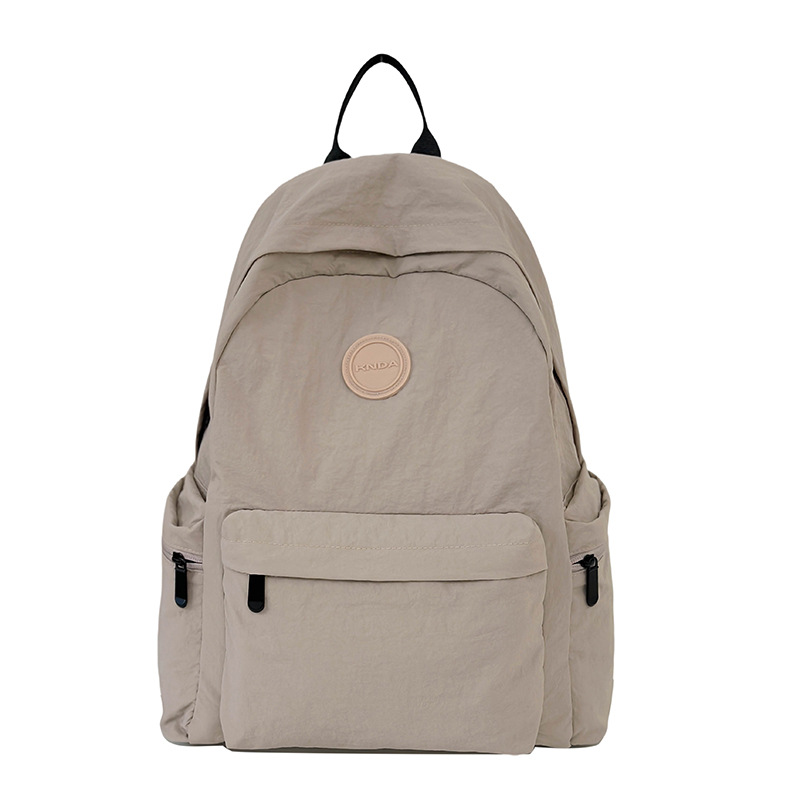 New casual backpack for women, a simple and lightweight Japanese-style commuting travel backpack with large capacity for junior and senior high school students Item Picture