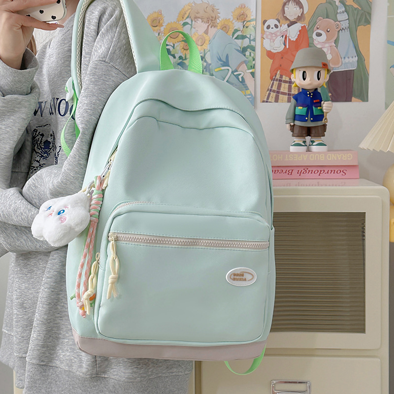 A new high-appeal college-style backpack for junior and senior high school students, which is casual, simple, lightweight, fashionable and versatile for commuting details Picture