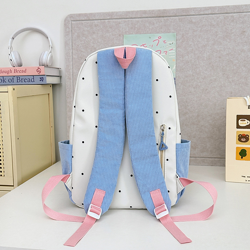A new Japanese-style backpack with a high level of appearance, sweet, fresh and cute printed patterns, and a large-capacity casual backpack for junior and senior high school students Specification drawing