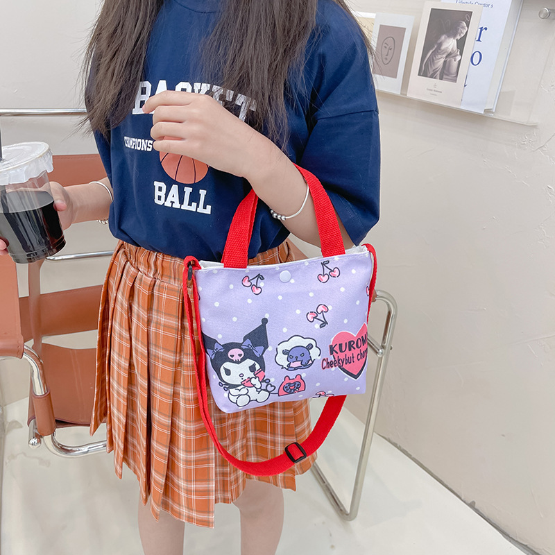 A cute girl's crossbody bag with comic graffiti, a large-capacity phone bag for parents and children, and a stylish canvas handbag for kids Application Scenario
