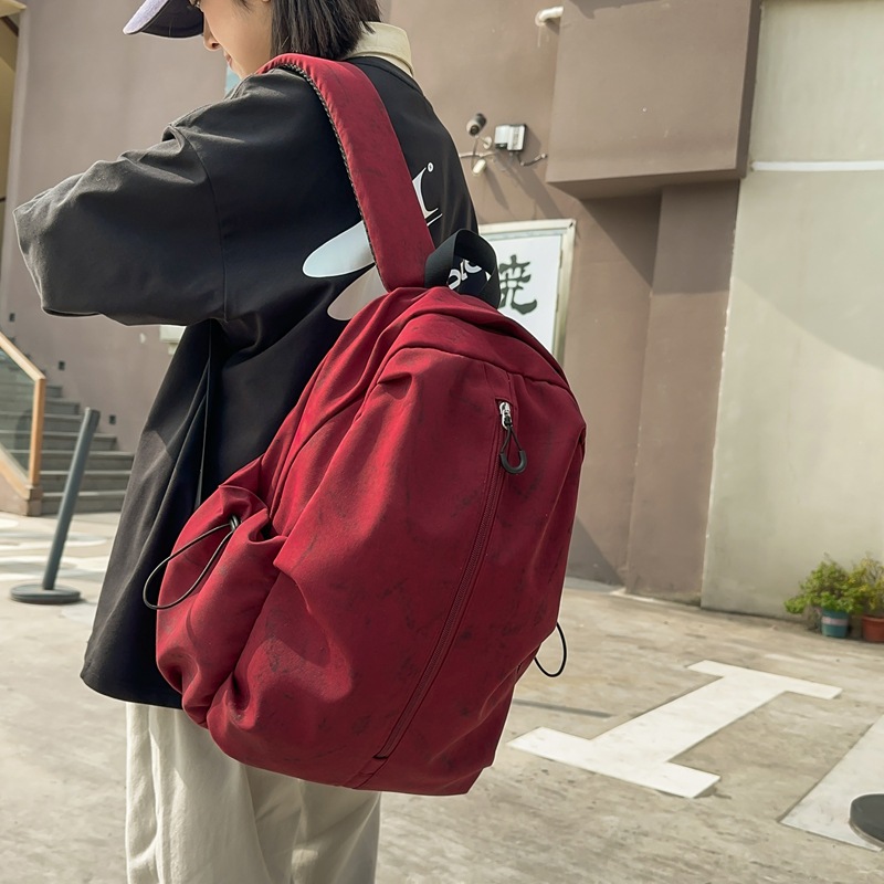 Large-capacity dark-patterned schoolbag with a design sense for junior high school students, high school and college students, couple workwear style computer backpack details Picture