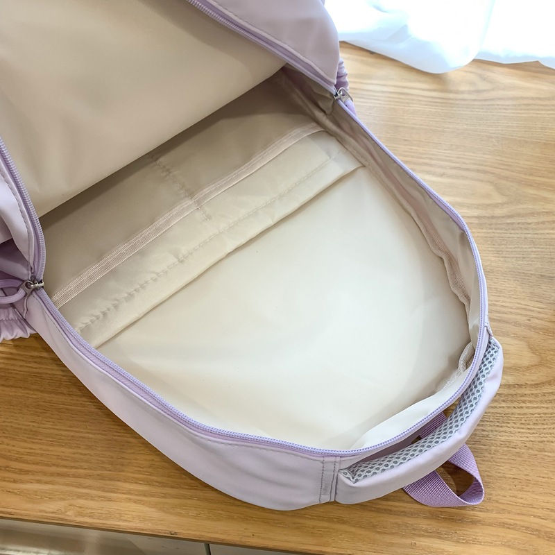 Japanese-style ins sweet campus solid-color backpacks for girls, cute and high appearance level, letter embroidery backpacks for primary and secondary school students Application Scenario