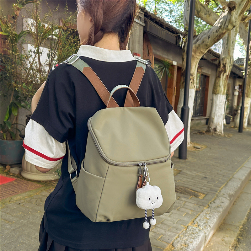 A new Japanese-style ins bucket backpack with a high aesthetic level, fresh and sweet solid color, and a simple travel backpack for middle and high school students full figure