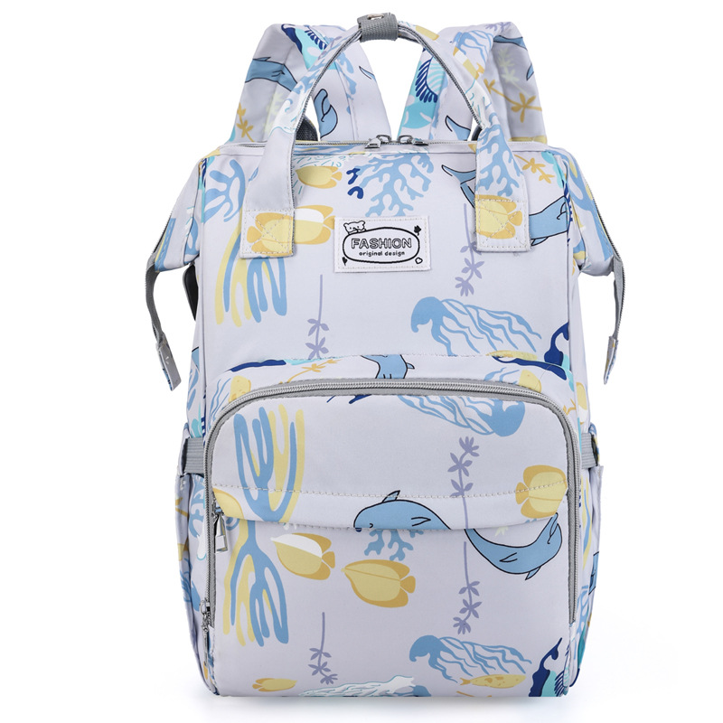 The new mommy bag for foreign trade, a fresh hand-held backpack, has a large capacity and is lightweight for going out. It can be used to hang baby strollers Item Picture