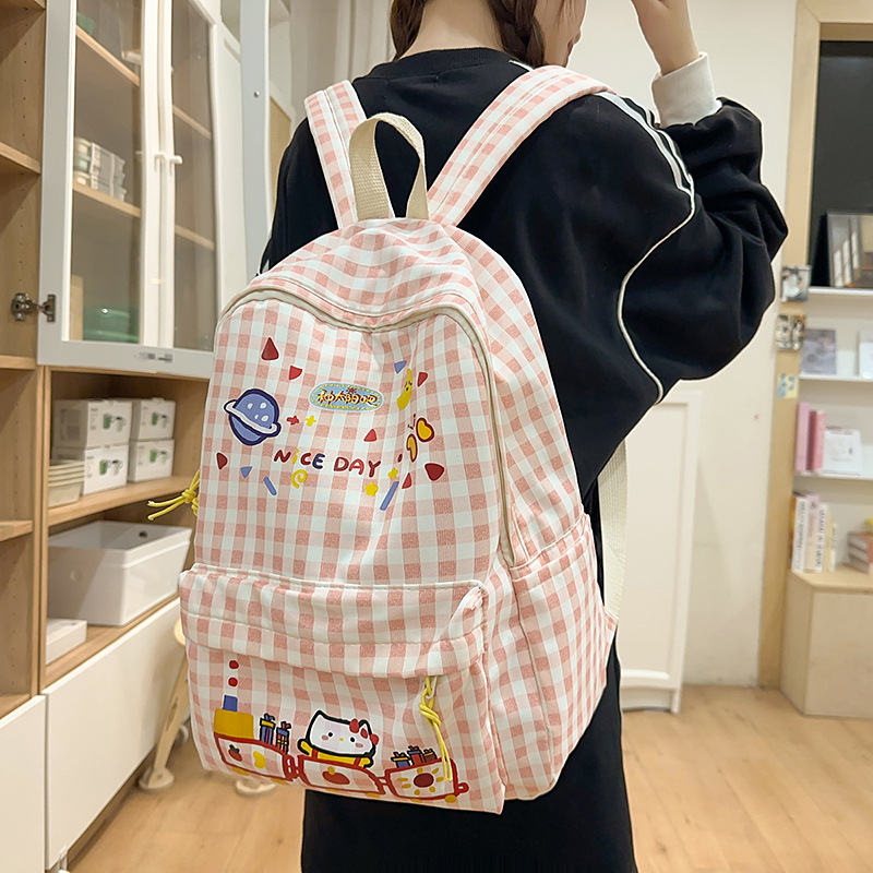 Japanese-style fresh, sweet and casual schoolbags for junior and senior high school students, simple and versatile backpacks, ins lightweight cartoon backpacks full figure