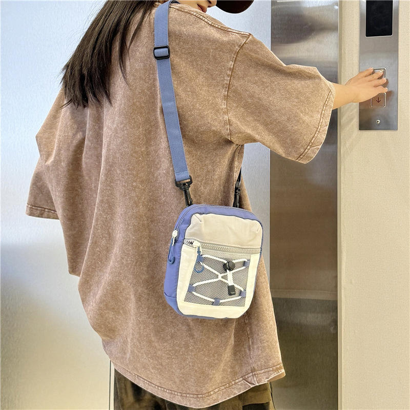 A new Korean-style niche design drawstring strap short-distance hiking bag for both men and women, a versatile crossbody bag for travel full figure
