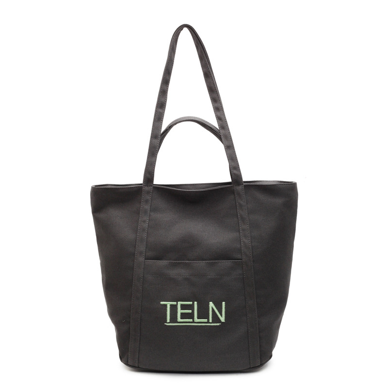 The 2025 new embroidered canvas bag is a versatile summer large-capacity handbag and a simple tote bag for classes and commuting Item Picture