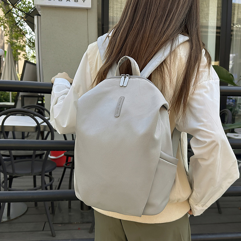 A fresh and sweet macaron-colored casual and simple large-capacity backpack, a new Japanese-style travel backpack for junior and senior high school students details Picture