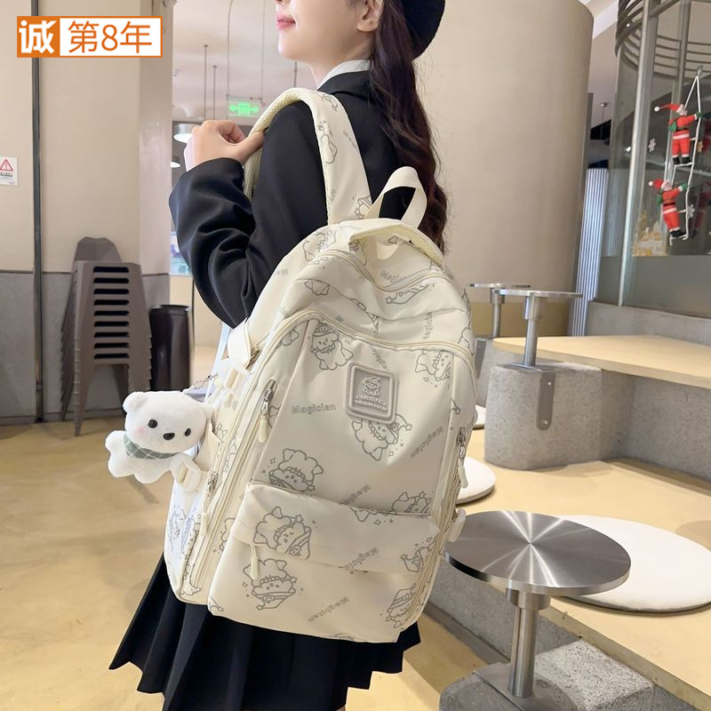 A simple and niche 2024 new high-appearance-level backpack for primary and secondary school students, a Japanese-style sweet girl backpack full figure