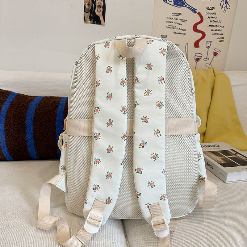 New backpack with fresh floral prints, Japanese-style high school and junior high school students, large-capacity schoolbag, casual and versatile backpack Application Scenario