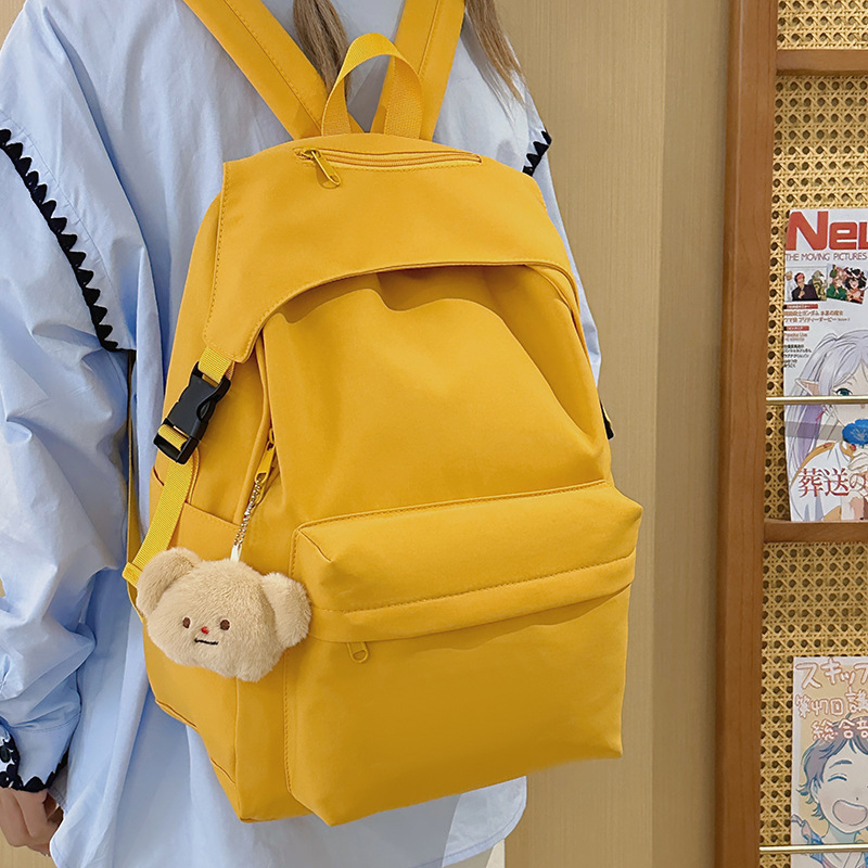 Japanese-style simple and versatile backpack, Korean-style solid color student schoolbag, lightweight, trendy, casual and fashionable backpack full figure