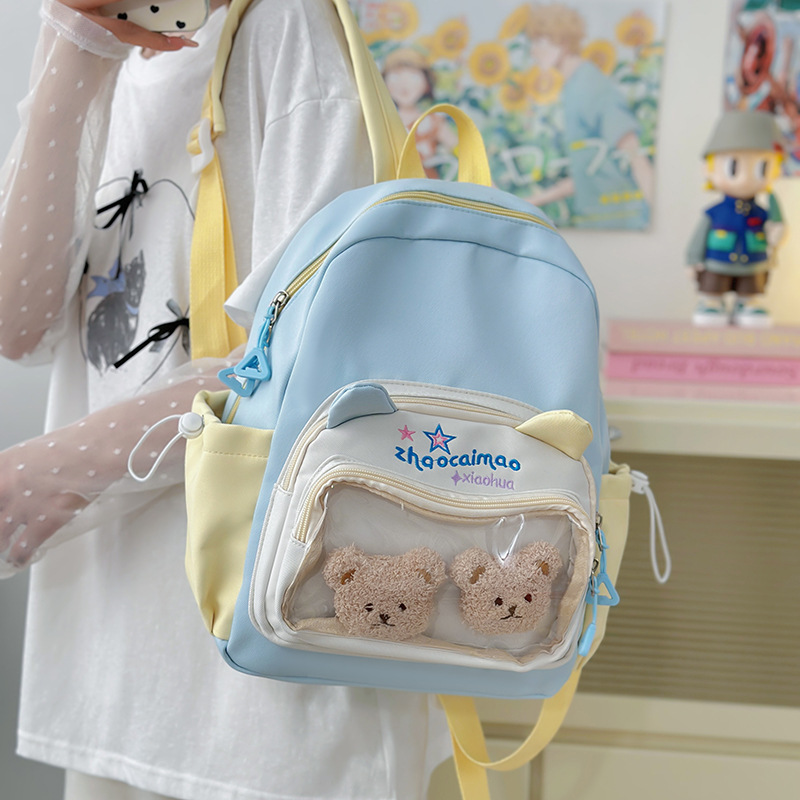 The new high-appearance-level college style fresh and cute 2D pain-pain bag with contrasting colors is a lightweight commuting backpack for primary and secondary school students details Picture