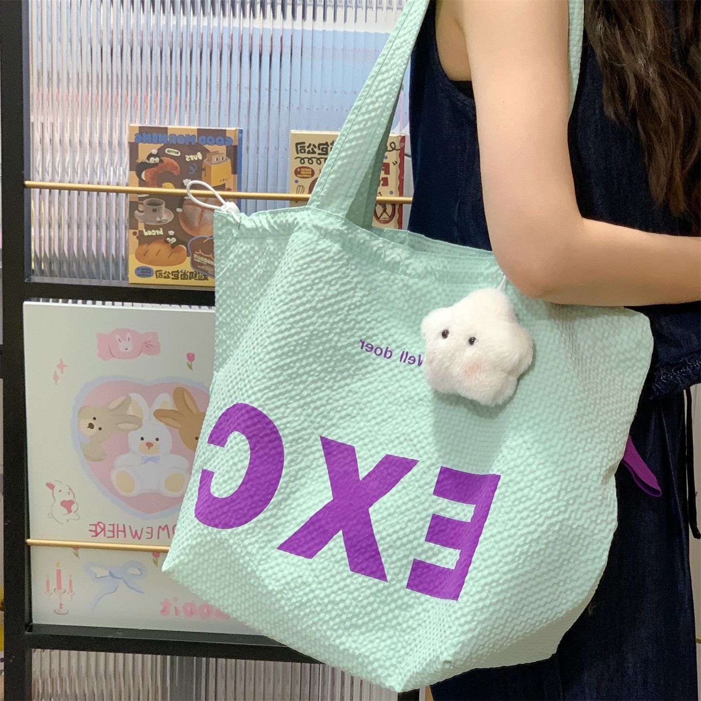 Korean-style artistic and simple drawstring solid color letter-shaped tote bag for women's casual, simple and lightweight commuting with large capacity crossbody details Picture