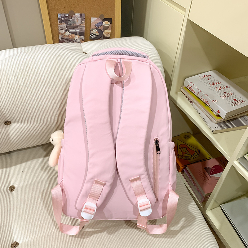 Solid-colored girls' backpacks, simple and lightweight schoolbags for junior high school students, cute little bears for girls, versatile backpacks for college students Specification drawing
