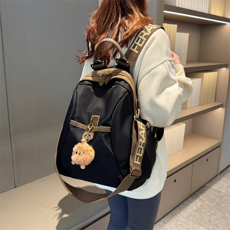 This is a new 2024 fashionable and lightweight travel bag for women, made of Oxford fabric. It's a versatile travel backpack for moms and kids details Picture