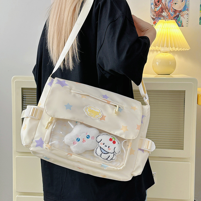 A cute crossbody bag for women, a new Japanese-style fresh and sweet transparent pain-relieving bag for students, a lightweight bag for class make-up details Picture
