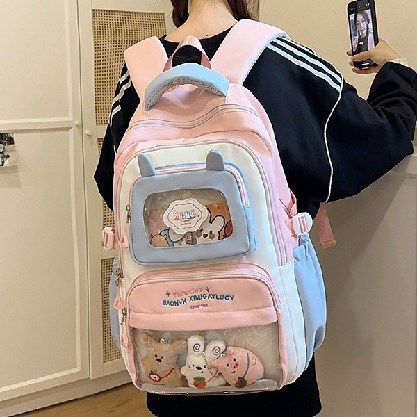 The new schoolbag for girls' high school students has a high level of appearance. It's an ins color-blocking painbag with a school style. It's a backpack for grades 3 to 5 of primary school students full figure