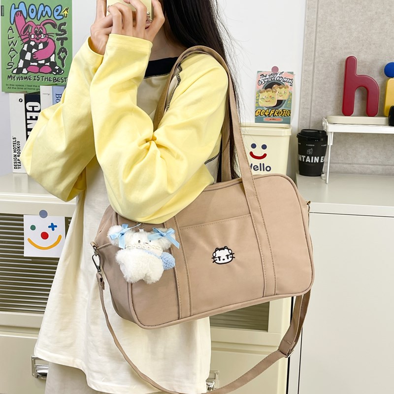 Cute school-style girl handbag, Japanese-style solid color versatile commuter single-shoulder bag, niche design simple crossbody bag details Picture