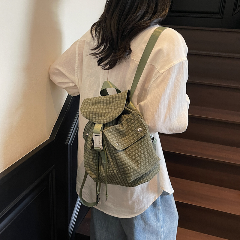 The new forest-themed ins high-appearance-level fresh checkered backpack is a lightweight and large-capacity backpack for women's mountain climbing and travel details Picture