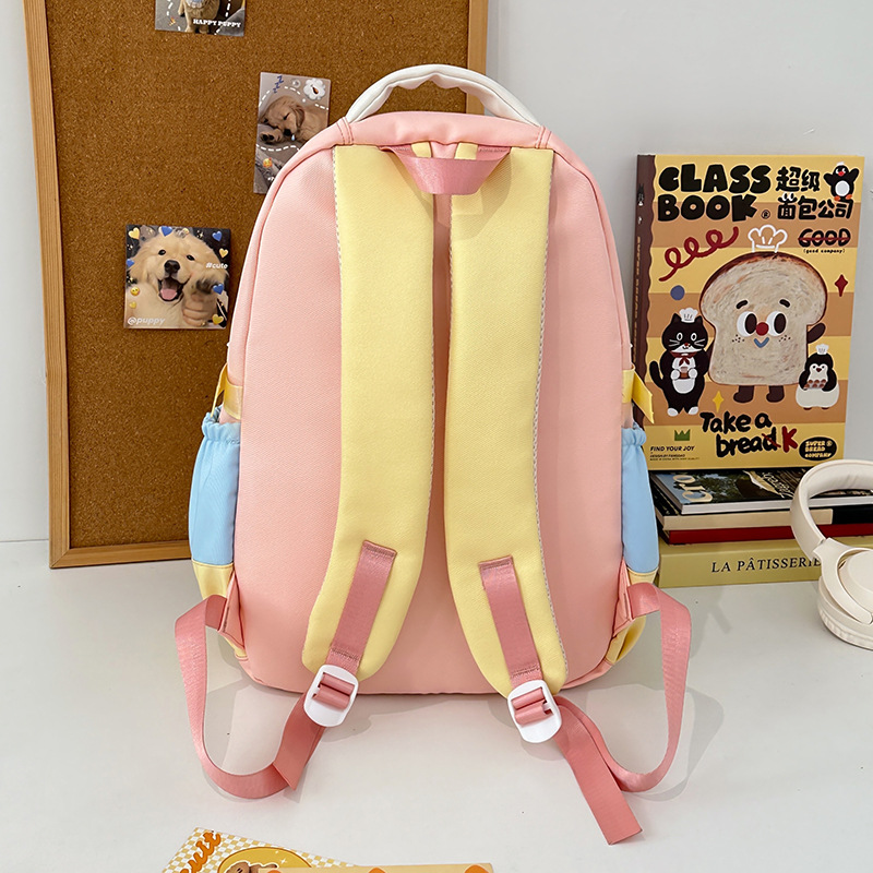 A fresh and cute color-blocking backpack with a large capacity for students, a school bag, a versatile Japanese-style backpack for junior high school students Specification drawing