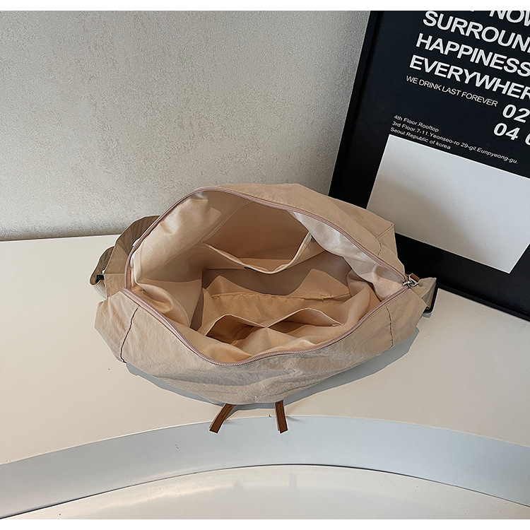 Japanese-style casual and laid-back student commuting tote bag, large capacity, simple solid color, light and versatile crossbody bag for girls Specification drawing