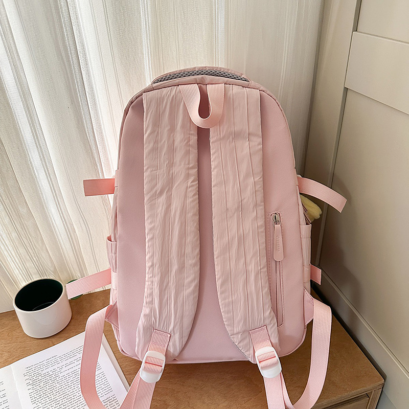A new high-appearance-level Japanese ins fresh and sweet macaron-colored backpack, a lightweight travel backpack for junior and senior high school students Specification drawing