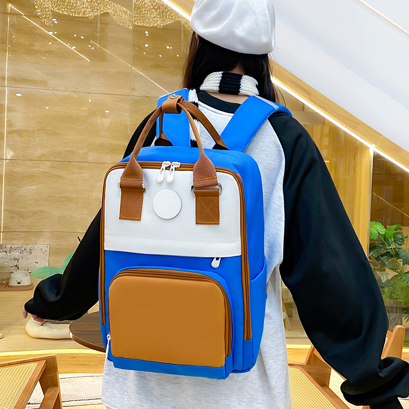 2025 New large-capacity children's hand-held tutorial bag, versatile, lightweight, waterproof backpack, casual training book bag details Picture