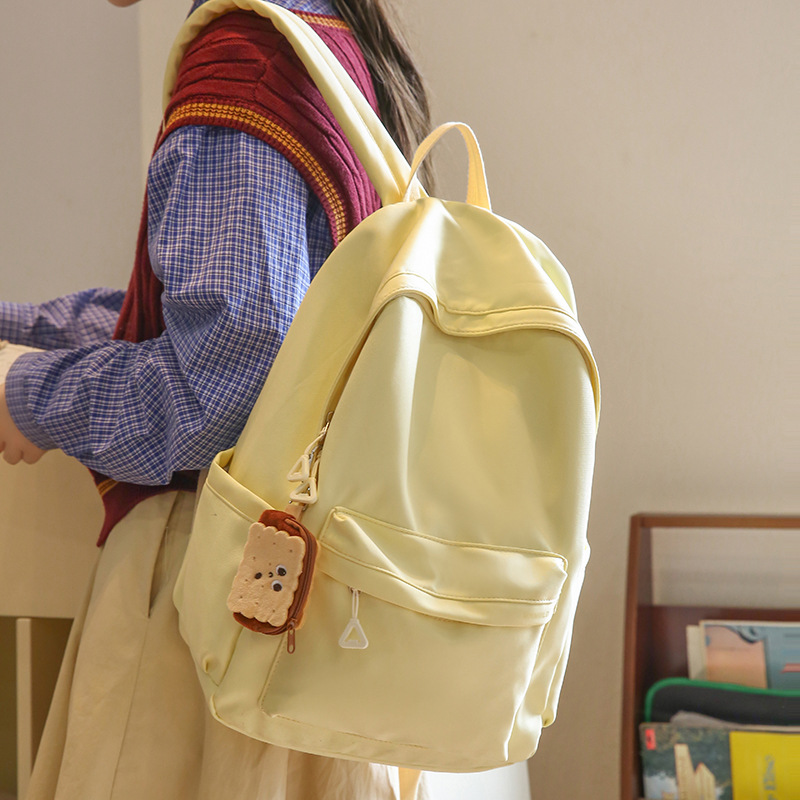 A fresh and cute candy-colored girl's backpack, simple and solid color, versatile best friend backpack, junior high school student schoolbag details Picture