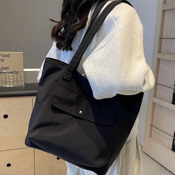 Versatile solid-color canvas bag, tote women's bag, large-capacity Korean-style simple and casual college student commuting and class bag full figure