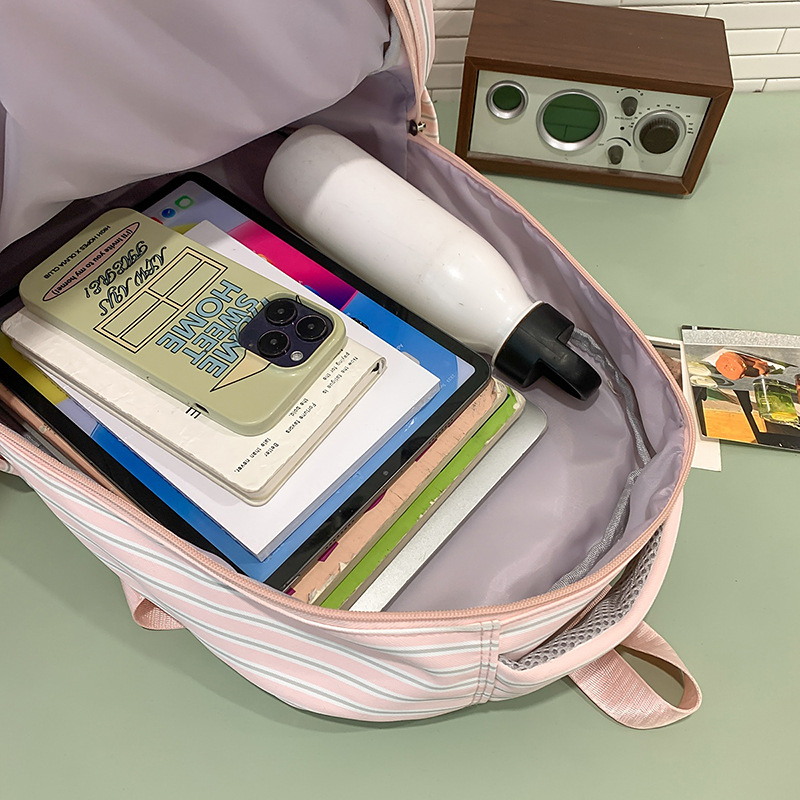 A new high-appearance-level, fresh and sweet striped transparent pain-relieving bag, a lightweight and large-capacity backpack for junior and senior high school students Application Scenario