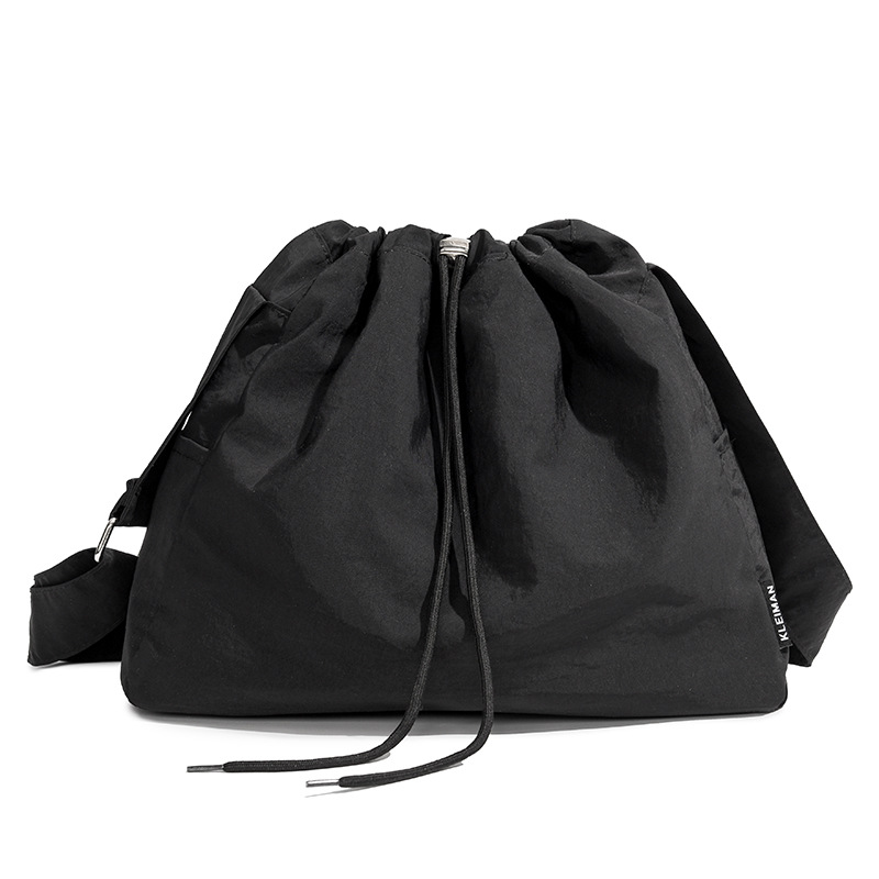 The new large-capacity dumpling single-shoulder bag for casual outings, the forest-style crossbody bag, and the simple Korean-style small bucket bag for commuting to work Item Picture