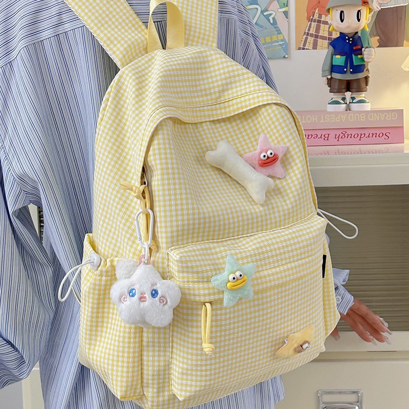 The 2025 new Japanese-style lightweight backpack for junior and senior high school students features a striped, casual, cute and star-shaped sweet schoolbag for young girls details Picture