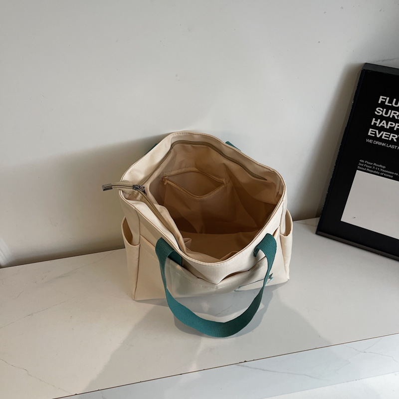 New summer Korean-style lightweight color-blocking hand-held canvas bag, casual and versatile shoulder bag, simple commuting tote bag Specification drawing