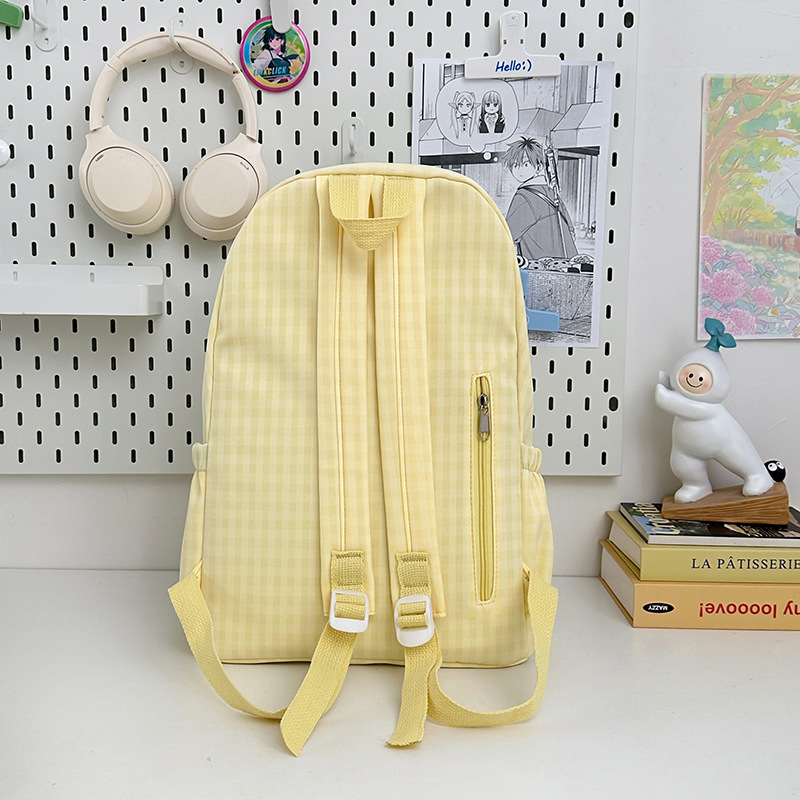 A new Japanese-style ins fresh, sweet and cute backpack for junior and senior high school students, featuring a simple and elegant design with a large capacity Specification drawing