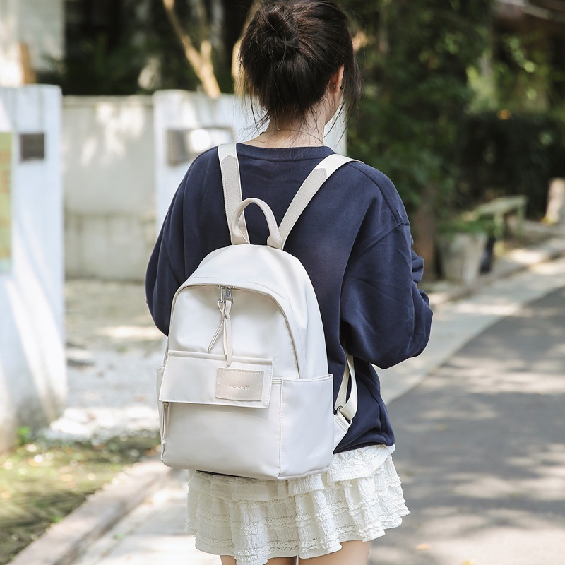 2025 New Hong Kong-style retro backpack, simple and casual, large-capacity student schoolbag, versatile travel waterproof backpack full figure