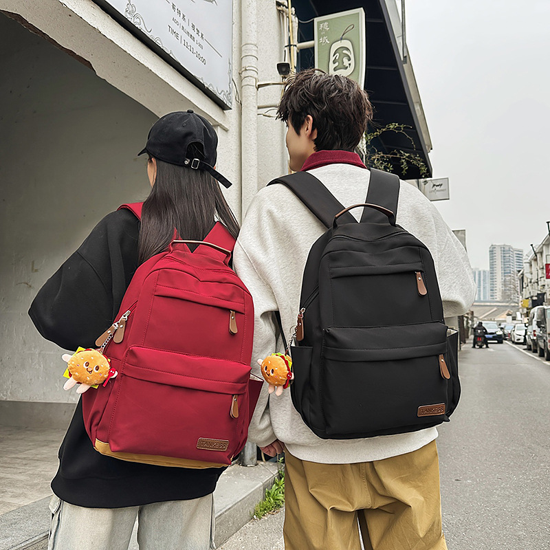 Casual and versatile backpack, Japanese retro fashion for girls, commuting computer travel backpack, solid color schoolbag for college students full figure